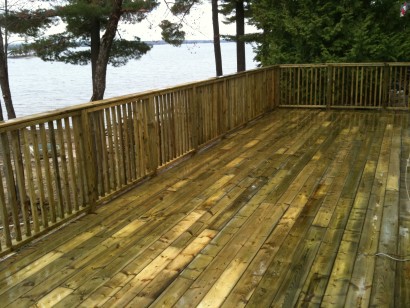 pressure treated deck built on rock face