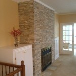decorative stone installed on fireplace wall