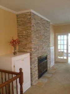 decorative stone installed on fireplace wall