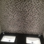 glass tile backsplash in bathroom
